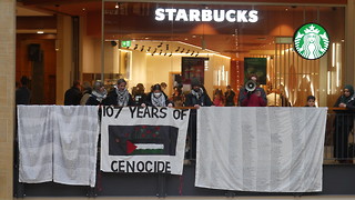 Pro-Palestinian protesters gather for remembrance rally