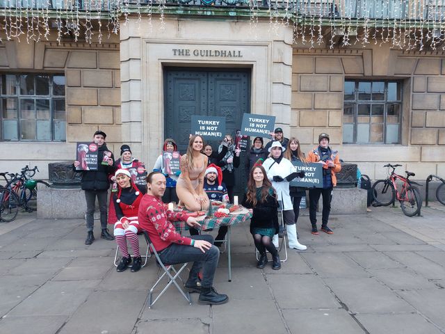 Animal rights groups stage 'Christmas dinner' protest in market square 